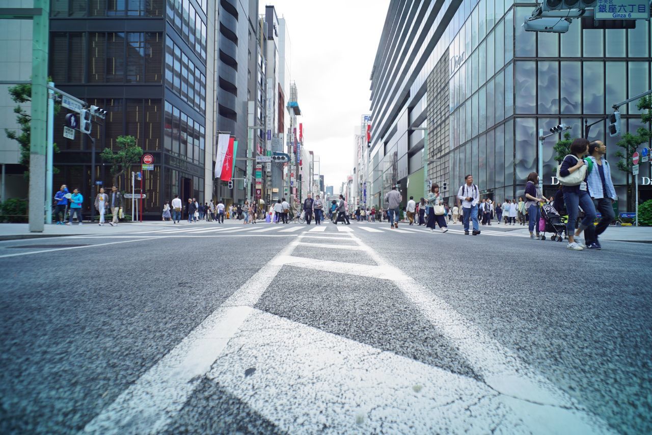 architecture, street, building exterior, large group of people, city, road, built structure, outdoors, day, modern, people