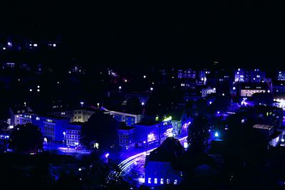 View of illuminated city at night