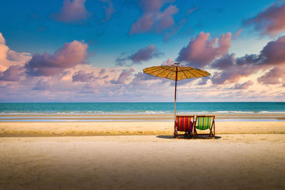 Scenic view of beach against sky