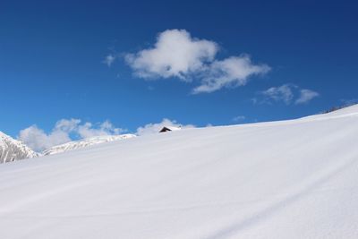 Scenic view of desert against sky during winter