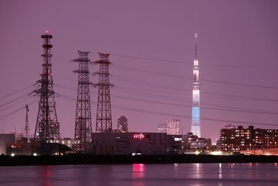 View of illuminated city at waterfront