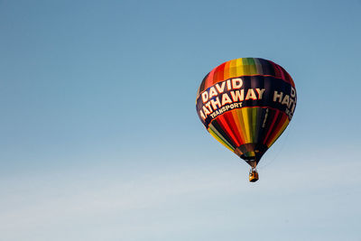 Low angle view of hot air balloon against clear sky