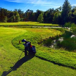 Golf bag on field