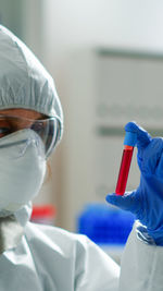 Doctor holding test tube at laboratory