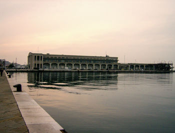 View of bridge over river in city