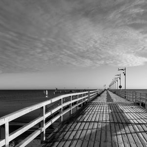 Pier over sea of sky.