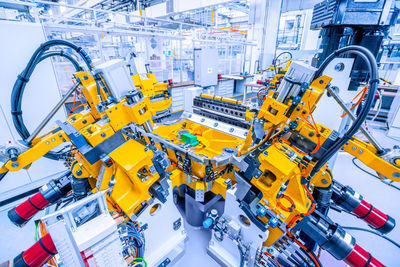 Low angle view of yellow machinery in factory