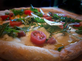 Close-up of pizza served in plate