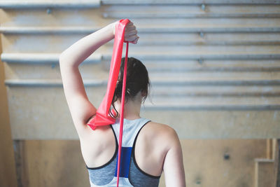 Rear view of woman exercising