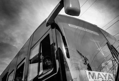 Low angle view of cars against sky