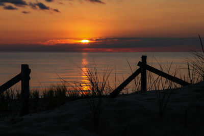 View of calm sea at sunset