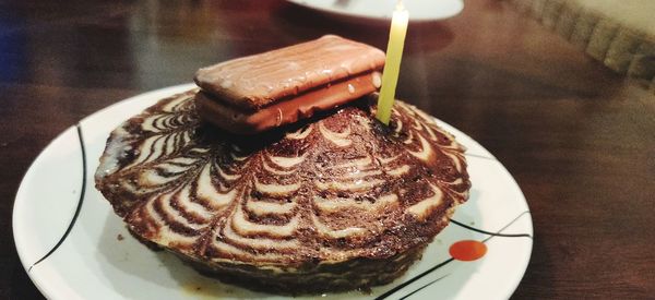 High angle view of cake in plate on table