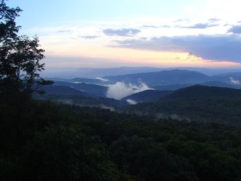 Scenic view of landscape against sky during sunset