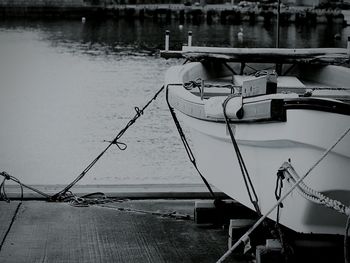 Boats moored at lakeshore