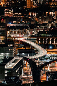 High angle view of illuminated modern buildings in city