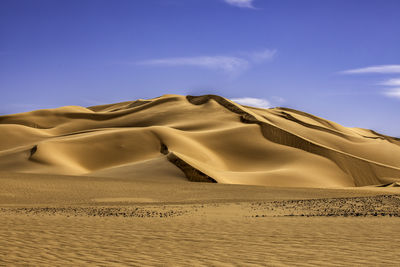 Scenic view of desert against sky
