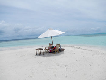 Scenic view of beach against sky