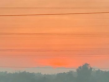 Scenic view of orange sky