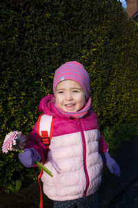 Portrait of cute girl in park during winter