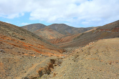 Scenic view of desert against sky