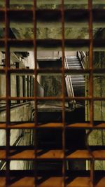 Close-up of open window in cage