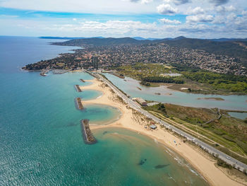 High angle view of bay against sky