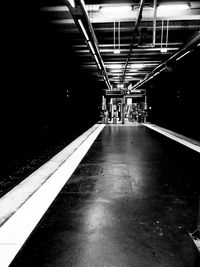 Train at railroad station at night