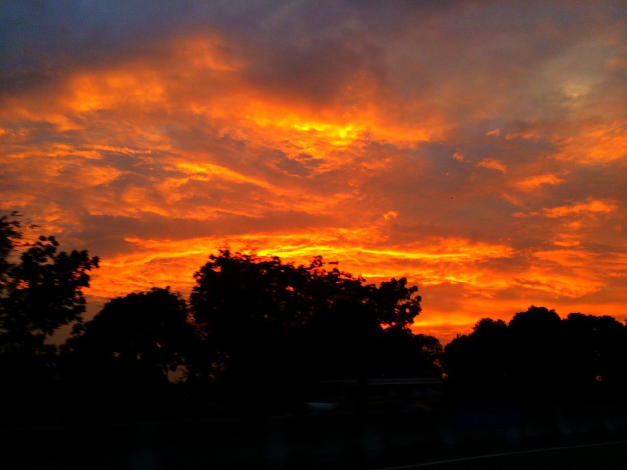 sunset, silhouette, tree, orange color, sky, beauty in nature, scenics, tranquility, tranquil scene, cloud - sky, nature, idyllic, dramatic sky, landscape, cloud, growth, outdoors, cloudy, no people, non-urban scene