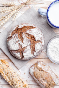 High angle view of bread on cutting board