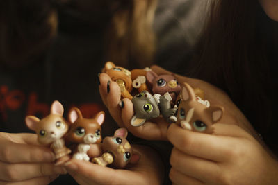 Close-up of woman holding toy