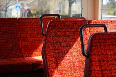 Empty chairs in the bus