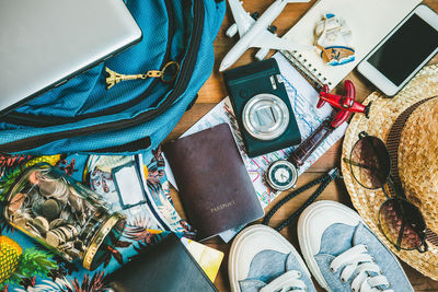 Directly above shot of travel equipment on table