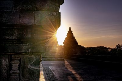 Panoramic view of temple against sky at sunset