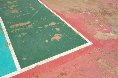 High angle view of footpath by swimming pool in city