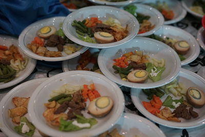 High angle view of food served on table