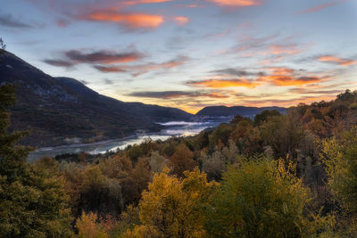 Scenic view of mountains against sky during sunset