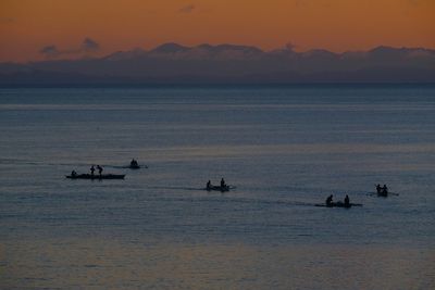 Scenic view of sea at sunset