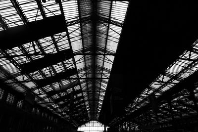 Low angle view of illuminated ceiling at railroad station