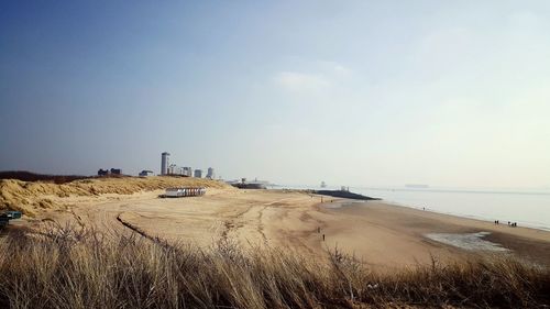 Scenic view of beach against clear sky