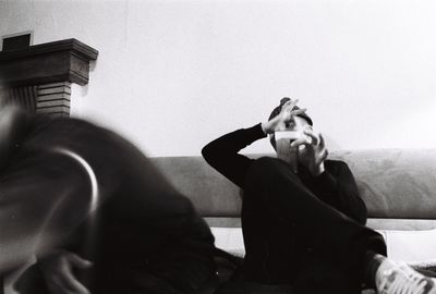 Woman sitting on sofa