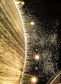 Close-up of illuminated snow at night