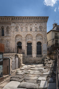 Exterior of historic building against sky