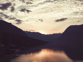 Scenic view of calm sea at sunset