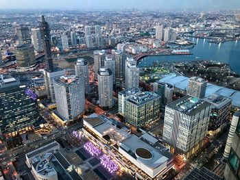 High angle view of river amidst buildings in city