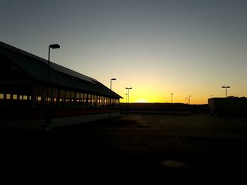 Silhouette of building against clear sky