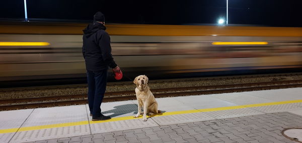 Blurred motion of train at railroad station platform