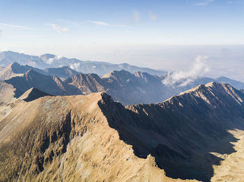 Panoramic view of mountain range against sky