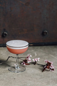 Gin flip cherry blossom cocktail still life