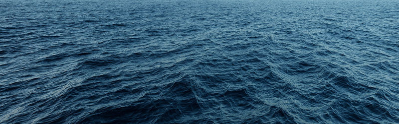 Beautiful blue sea with waves. view from above. huge ocean. background with copyspace for banner. 