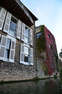 Low angle view of old building against sky